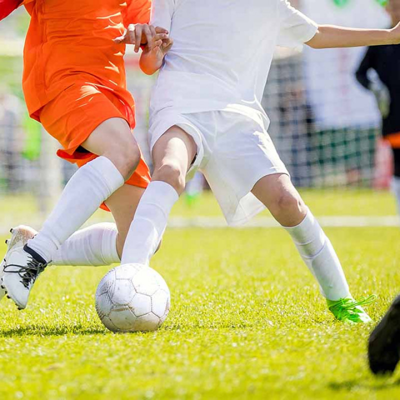 Youth Playing Soccer